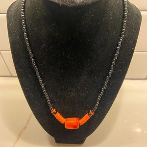 Gorgeous hand beaded black and orange artisan craft necklace